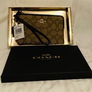 Brand new Coach wristlet